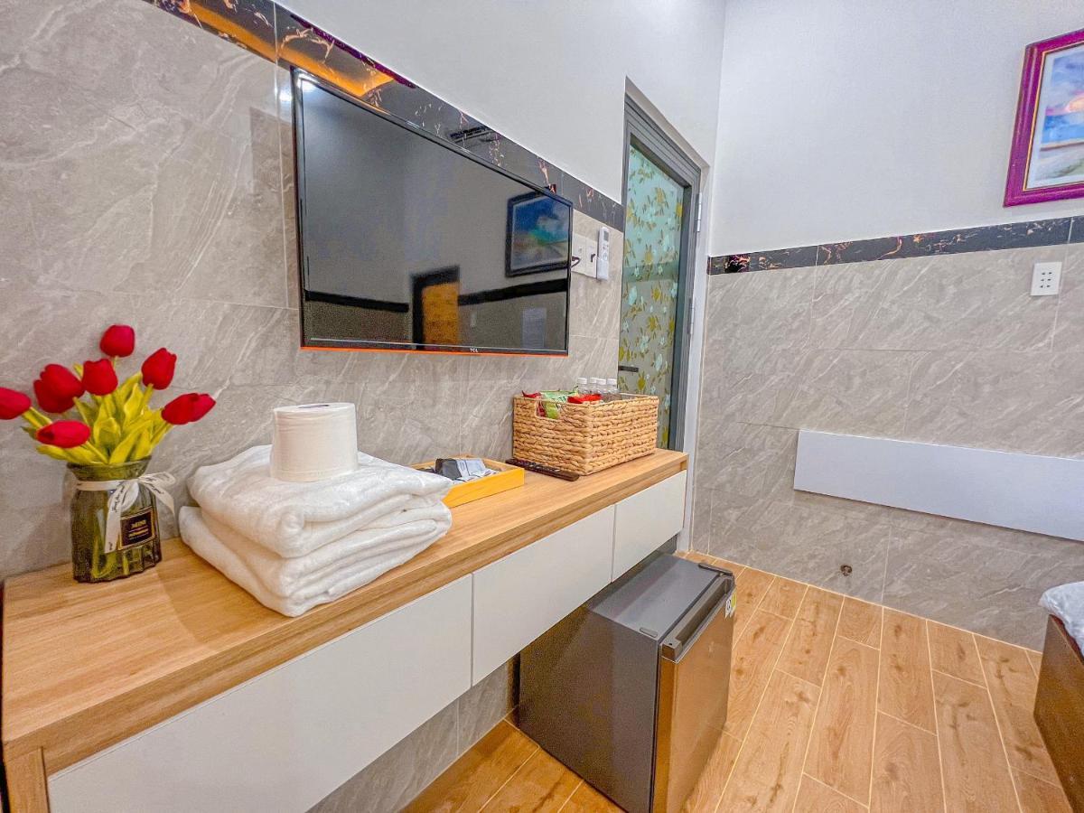 Homestay Qhome Chi Khu Co Ong Buitenkant foto